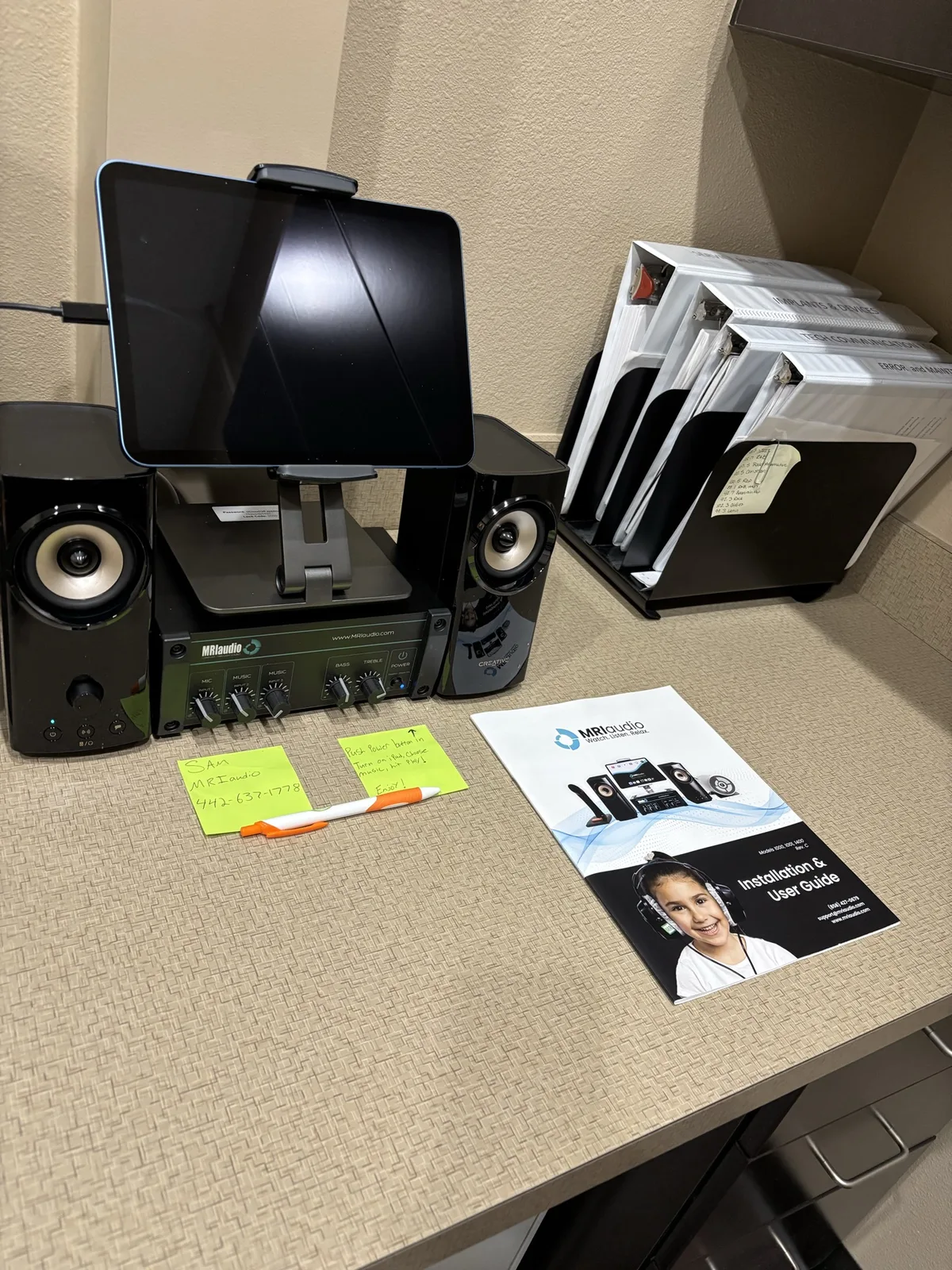 The Premium Sound System's control station with its user guide