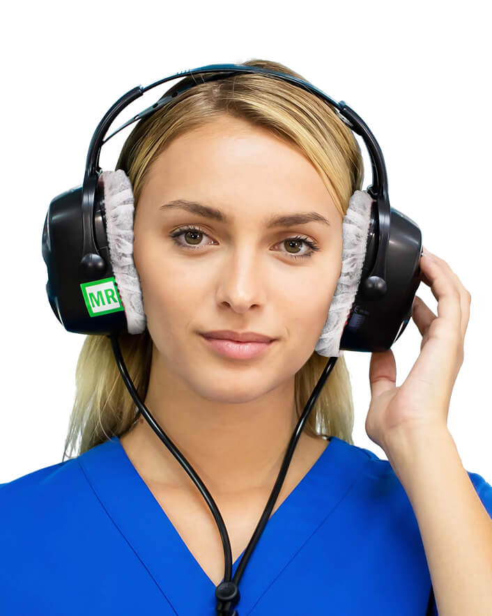 MRI patient listening to music with MRI safe headphones