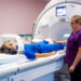 MRI technologist & patient using MRI headphones